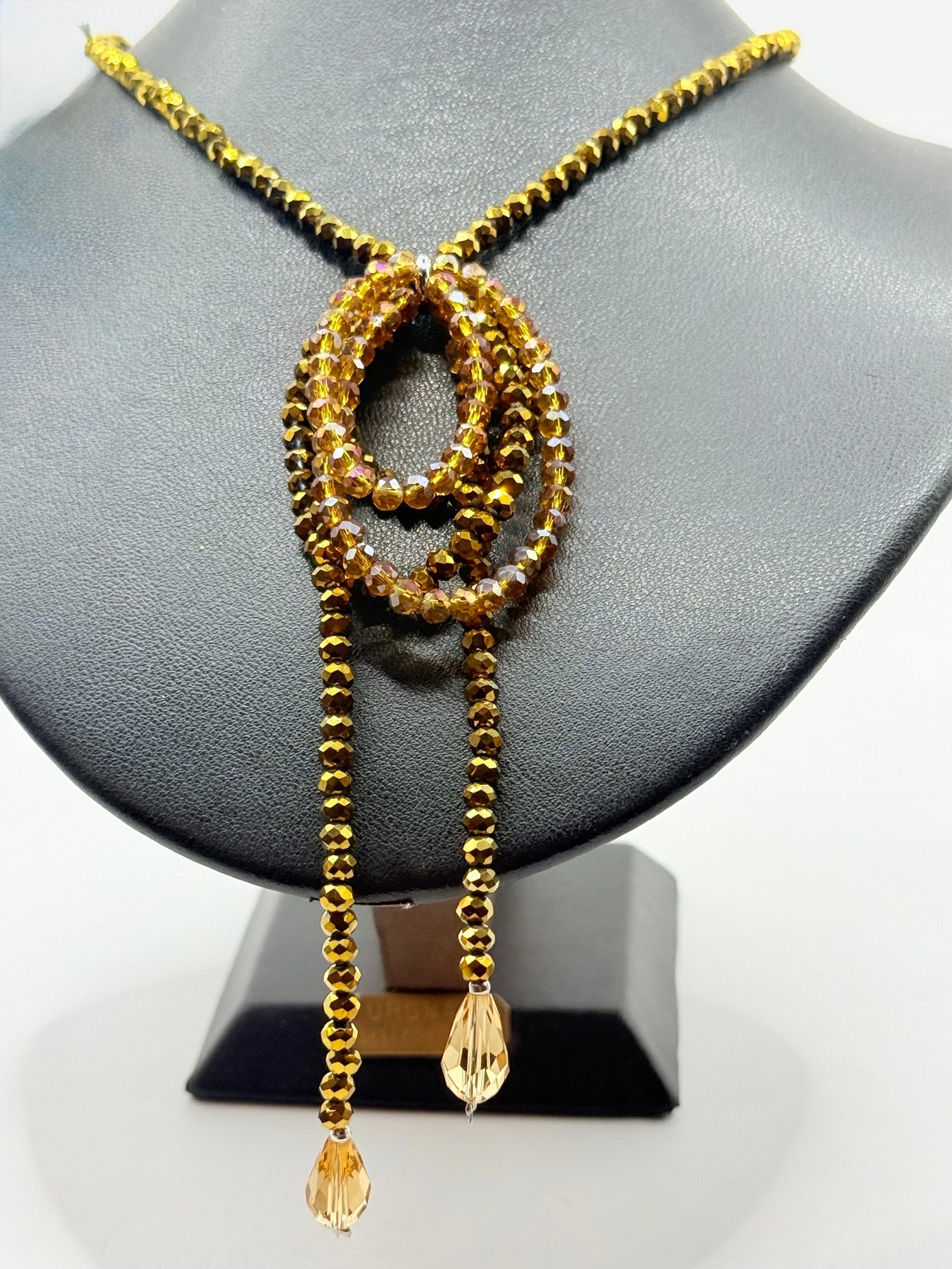 Collana in cristallo topazio, design ad anelli circolari con gocce cristallo champagne. - immagine 2