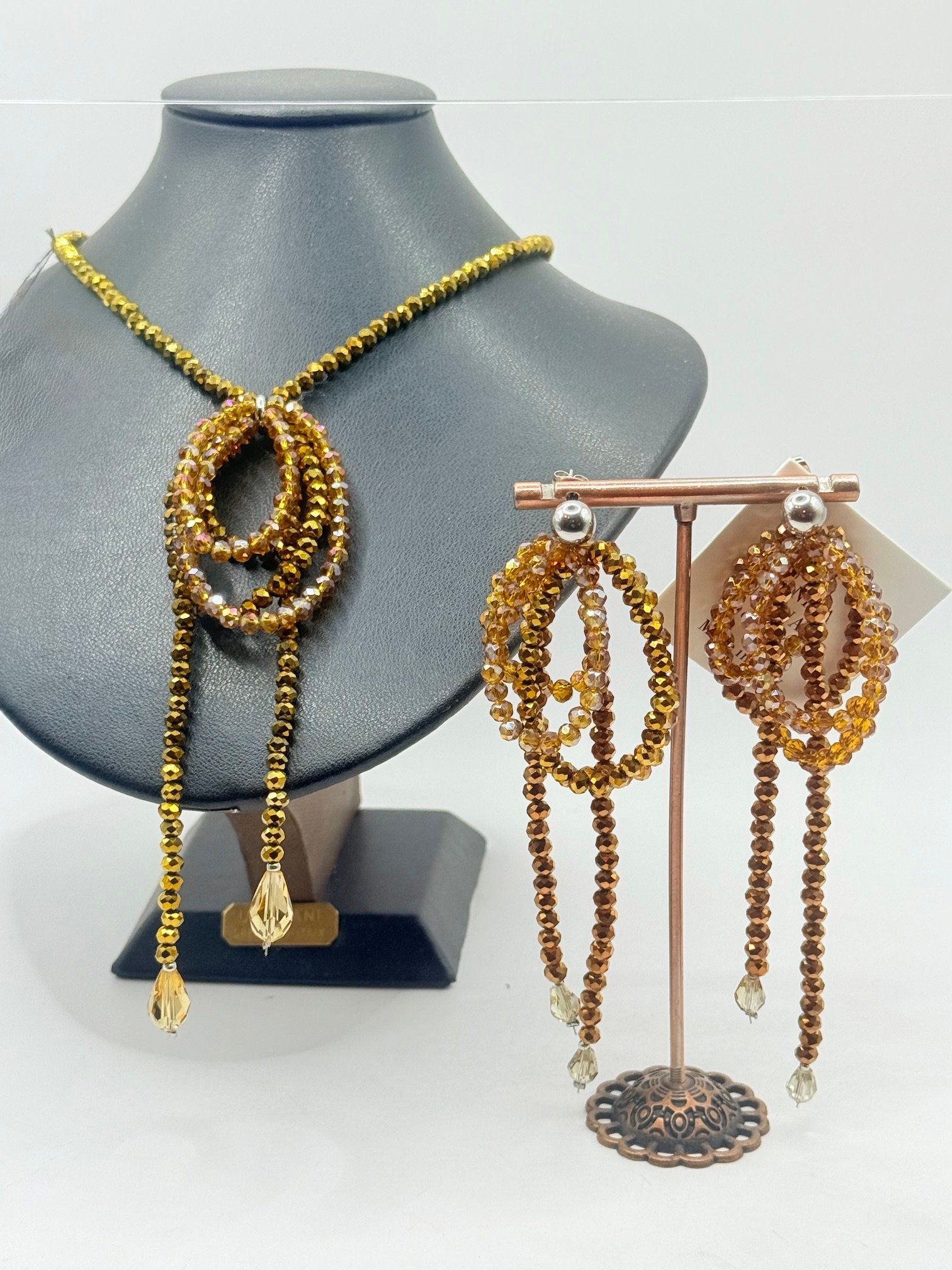 Collana in cristallo topazio, design ad anelli circolari con gocce cristallo champagne. - immagine 3