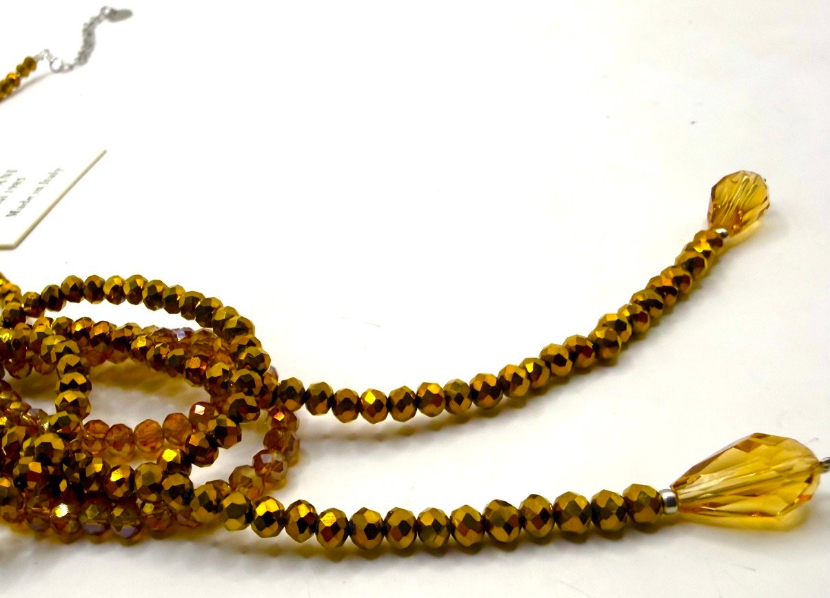 Collana in cristallo topazio, design ad anelli circolari con gocce cristallo champagne.